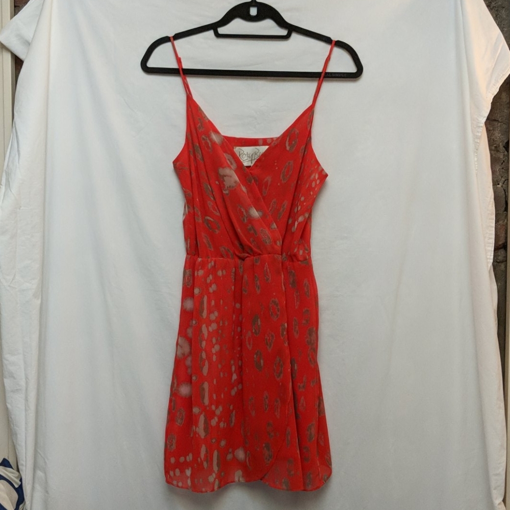 Rory Beca orange print silk mini-dress.